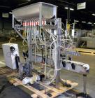 Used Fluid Packaging Solutions 12 Head Inline Automatic Time / Gravity Liquid Filler. Fabricated with 4-1/2