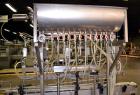 Used Fluid Packaging Solutions 12 Head Inline Automatic Time / Gravity Liquid Filler. Fabricated with 4-1/2
