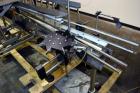 Used Fluid Packaging Solutions 12 Head Inline Automatic Time / Gravity Liquid Filler. Fabricated with 4-1/2