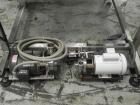 Used Inline Filling Systems 12 head inline time gravity filler. Capable of speeds over 100 bottle per minute. Has star wheel indexing system, neck guides, drip tray, and 12 'long x 4-1/2