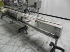 Used Inline Filling Systems 12 head inline time gravity filler. Capable of speeds over 100 bottle per minute. Has star wheel indexing system, neck guides, drip tray, and 12 'long x 4-1/2