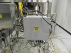 Used Inline Filling Systems 12 head inline time gravity filler. Capable of speeds over 100 bottle per minute. Has star wheel indexing system, neck guides, drip tray, and 12 'long x 4-1/2