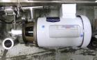 Used Inline Filling Systems 12 head inline time gravity filler. Capable of speeds over 100 bottle per minute. Has star wheel indexing system, neck guides, drip tray, and 12 'long x 4-1/2