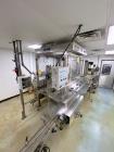 Used Kaps All (Fills-All) Model FA-R-18E Rotary 18 Head Pressure Filler. Capable of speeds over 150 Containers per minute depending on application.