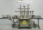 Used MRM Model GRC-A Straight Line Pressure Overflow Liquid Filler