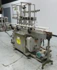 Used MRM Model GRC-A Straight Line Pressure Overflow Liquid Filler