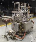 Used MRM Model GRC-A Straight Line Pressure Overflow Liquid Filler