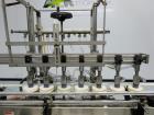Used MRM Model GRC-A Straight Line Pressure Overflow Liquid Filler