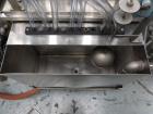 Used MRM Model GRC-A Straight Line Pressure Overflow Liquid Filler