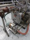 Used MRM Model GRC-A Straight Line Pressure Overflow Liquid Filler