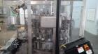 Used Pneumatic Scale Pneumaflow-2 Filler, 20 Heads, previously used to fill 4 ounce bottles.