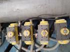 Used-Severn Trent Services / UAT 8-Head Overflow Gravity Filler