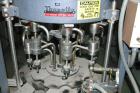 Used- U.S. Bottlers 8 Head Rotary Gravity Fillter. Has 1/2