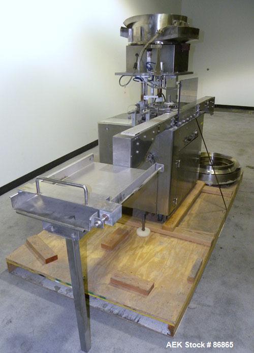 Used Chase-Logeman FS2-12 Monoblock Filler & Stopper Machine. Capable of speeds up to 60 bpm. Fill range: 0-125 ml with change parts. Vial size range: maximum diameter to 2-1/8" and up to 6" high. St...