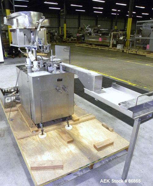 Used Chase-Logeman FS2-12 Monoblock Filler & Stopper Machine. Capable of speeds up to 60 bpm. Fill range: 0-125 ml with change parts. Vial size range: maximum diameter to 2-1/8" and up to 6" high. St...