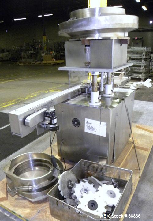 Used Chase-Logeman FS2-12 Monoblock Filler & Stopper Machine. Capable of speeds up to 60 bpm. Fill range: 0-125 ml with change parts. Vial size range: maximum diameter to 2-1/8" and up to 6" high. St...