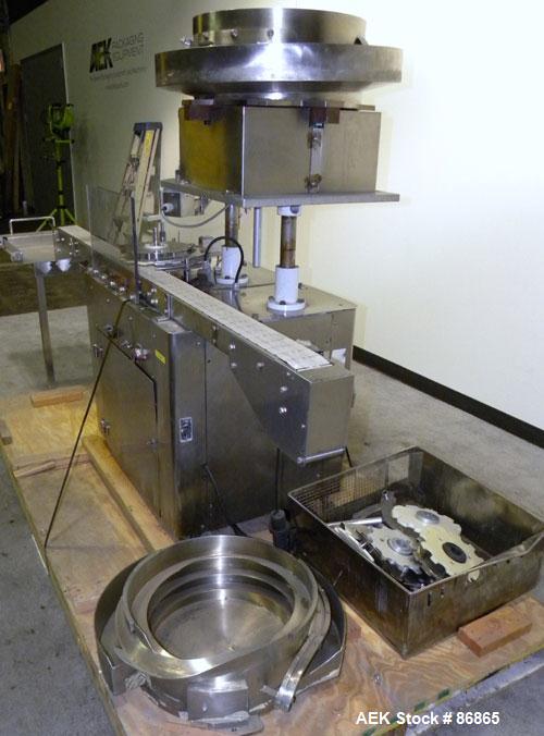 Used Chase-Logeman FS2-12 Monoblock Filler & Stopper Machine. Capable of speeds up to 60 bpm. Fill range: 0-125 ml with change parts. Vial size range: maximum diameter to 2-1/8" and up to 6" high. St...