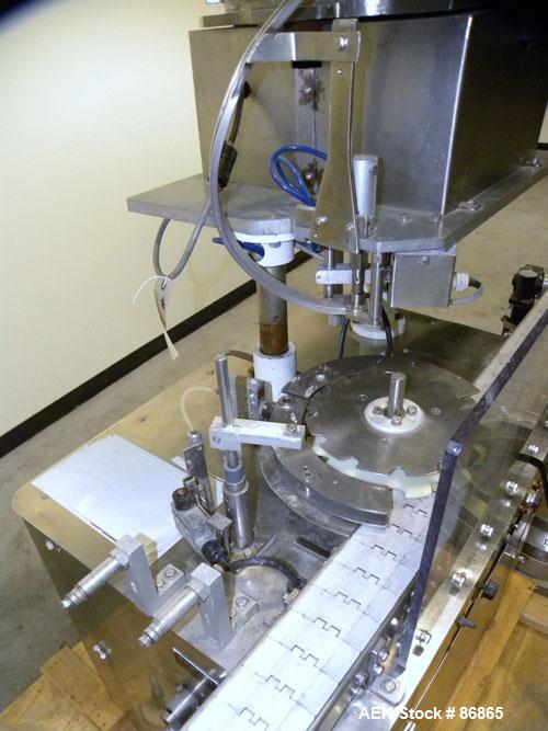 Used Chase-Logeman FS2-12 Monoblock Filler & Stopper Machine. Capable of speeds up to 60 bpm. Fill range: 0-125 ml with change parts. Vial size range: maximum diameter to 2-1/8" and up to 6" high. St...