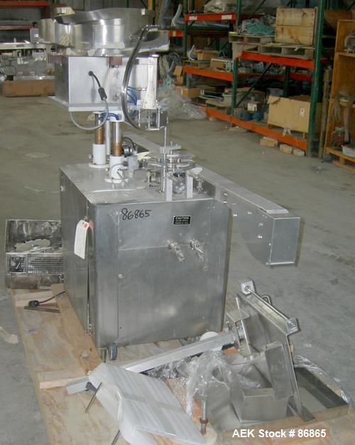 Used Chase-Logeman FS2-12 Monoblock Filler & Stopper Machine. Capable of speeds up to 60 bpm. Fill range: 0-125 ml with change parts. Vial size range: maximum diameter to 2-1/8" and up to 6" high. St...