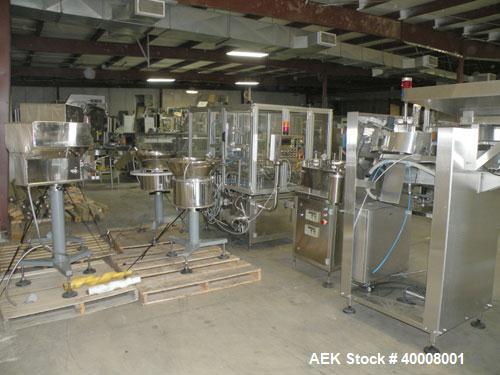 Used Comas Monoblock Line for Fill/Plug/Cap consisting of: (1) Comas Model RS6 Monoblock Filler, Tipper and screw Capper with Integrated Palace Model P2V5 Bulk bottle unscrambler. Has two head perist...
