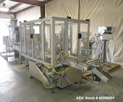 Used Comas Monoblock Line for Fill/Plug/Cap consisting of: (1) Comas Model RS6 Monoblock Filler, Tipper and screw Capper with Integrated Palace Model P2V5 Bulk bottle unscrambler. Has two head perist...
