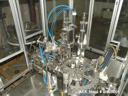 Used Comas Monoblock Line for Fill/Plug/Cap consisting of: (1) Comas Model RS6 Monoblock Filler, Tipper and screw Capper with Integrated Palace Model P2V5 Bulk bottle unscrambler. Has two head perist...