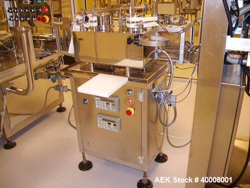 Used Comas Monoblock Line for Fill/Plug/Cap consisting of: (1) Comas Model RS6 Monoblock Filler, Tipper and screw Capper with Integrated Palace Model P2V5 Bulk bottle unscrambler. Has two head perist...