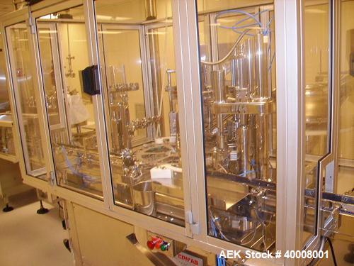 Used Comas Monoblock Line for Fill/Plug/Cap consisting of: (1) Comas Model RS6 Monoblock Filler, Tipper and screw Capper with Integrated Palace Model P2V5 Bulk bottle unscrambler. Has two head perist...