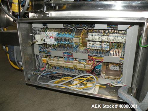 Used Comas Monoblock Line for Fill/Plug/Cap consisting of: (1) Comas Model RS6 Monoblock Filler, Tipper and screw Capper with Integrated Palace Model P2V5 Bulk bottle unscrambler. Has two head perist...