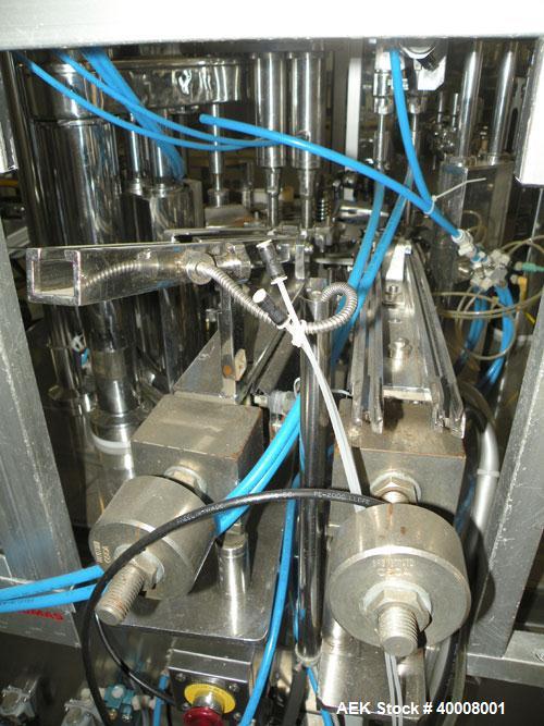 Used Comas Monoblock Line for Fill/Plug/Cap consisting of: (1) Comas Model RS6 Monoblock Filler, Tipper and screw Capper with Integrated Palace Model P2V5 Bulk bottle unscrambler. Has two head perist...