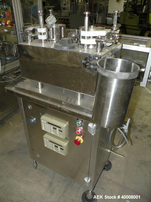 Used Comas Monoblock Line for Fill/Plug/Cap consisting of: (1) Comas Model RS6 Monoblock Filler, Tipper and screw Capper with Integrated Palace Model P2V5 Bulk bottle unscrambler. Has two head perist...