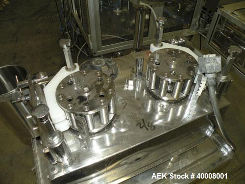 Used Comas Monoblock Line for Fill/Plug/Cap consisting of: (1) Comas Model RS6 Monoblock Filler, Tipper and screw Capper with Integrated Palace Model P2V5 Bulk bottle unscrambler. Has two head perist...
