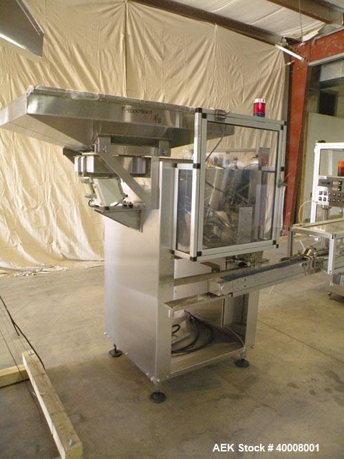 Used Comas Monoblock Line for Fill/Plug/Cap consisting of: (1) Comas Model RS6 Monoblock Filler, Tipper and screw Capper with Integrated Palace Model P2V5 Bulk bottle unscrambler. Has two head perist...