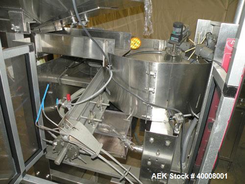 Used Comas Monoblock Line for Fill/Plug/Cap consisting of: (1) Comas Model RS6 Monoblock Filler, Tipper and screw Capper with Integrated Palace Model P2V5 Bulk bottle unscrambler. Has two head perist...