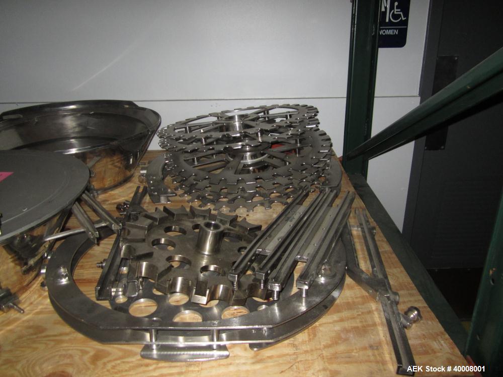 Used Comas Monoblock Line for Fill/Plug/Cap consisting of: (1) Comas Model RS6 Monoblock Filler, Tipper and screw Capper with Integrated Palace Model P2V5 Bulk bottle unscrambler. Has two head perist...