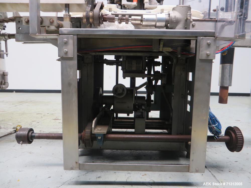 Used Consolidated Liquid Filler / Capper.