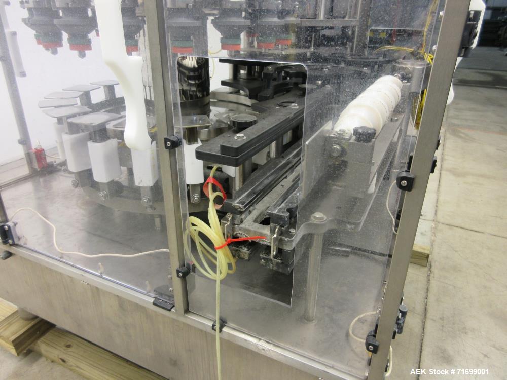 Used Filler Specialties Model AWFS-18-6-R Monoblock Rotary Filler and Capper