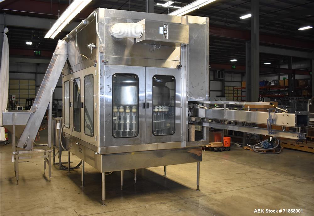 Used Fogg Model FA4214 High Speed Monoblock Liquid Filler and Capper.