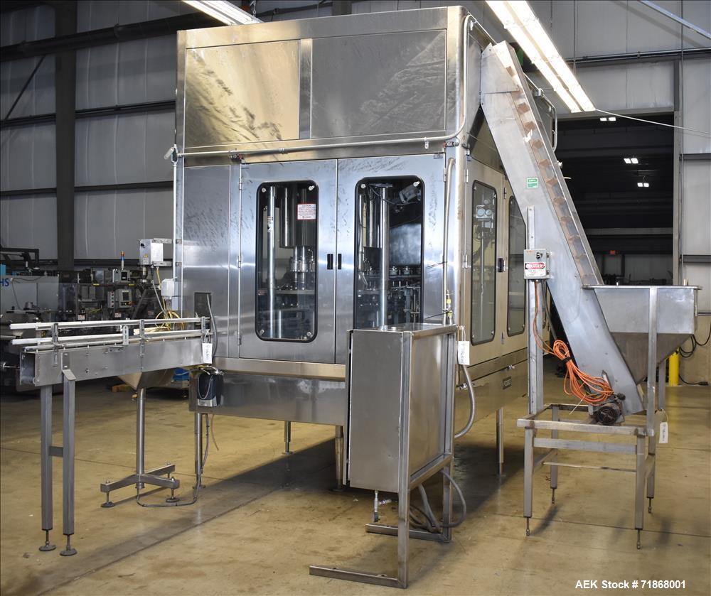 Used Fogg Model FA4214 High Speed Monoblock Liquid Filler and Capper.
