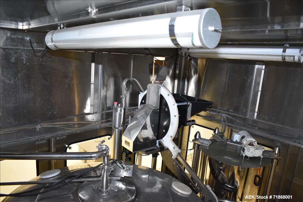 Used Fogg Model FA4214 High Speed Monoblock Liquid Filler and Capper.