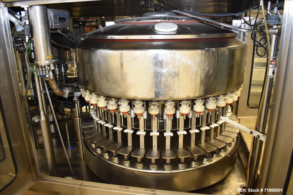 Used Fogg Model FA4214 High Speed Monoblock Liquid Filler and Capper.
