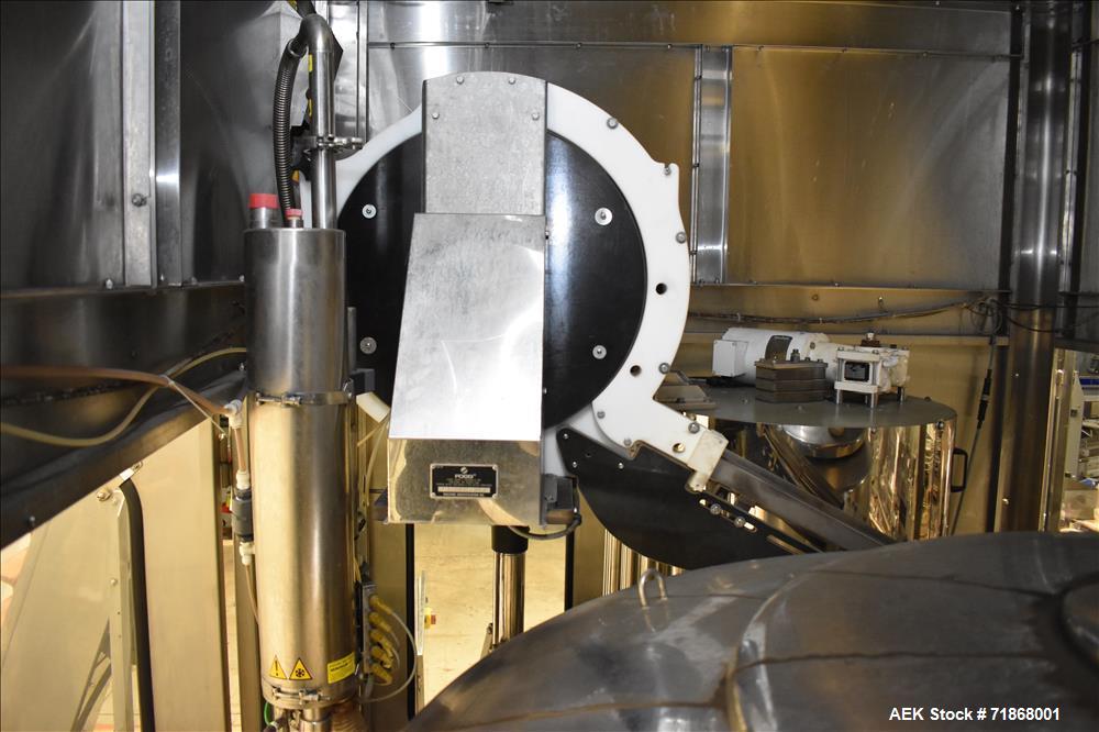Used Fogg Model FA4214 High Speed Monoblock Liquid Filler and Capper.