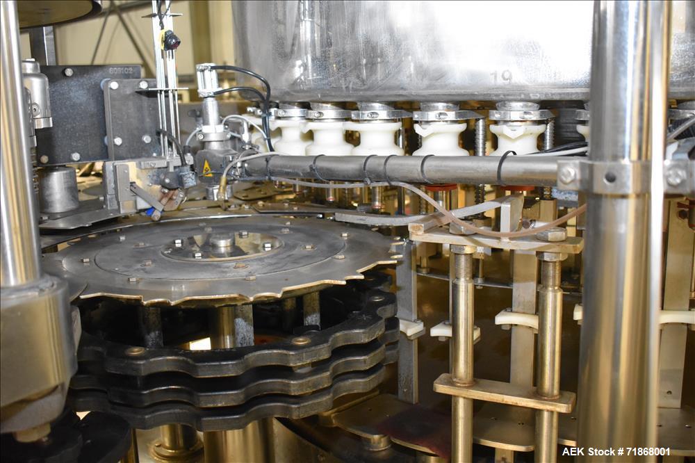 Used Fogg Model FA4214 High Speed Monoblock Liquid Filler and Capper.