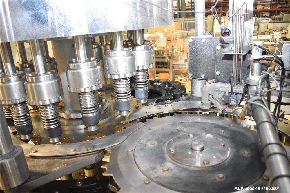 Used Fogg Model FA4214 High Speed Monoblock Liquid Filler and Capper.