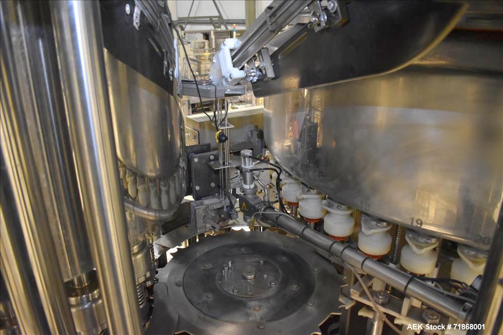 Used Fogg Model FA4214 High Speed Monoblock Liquid Filler and Capper.