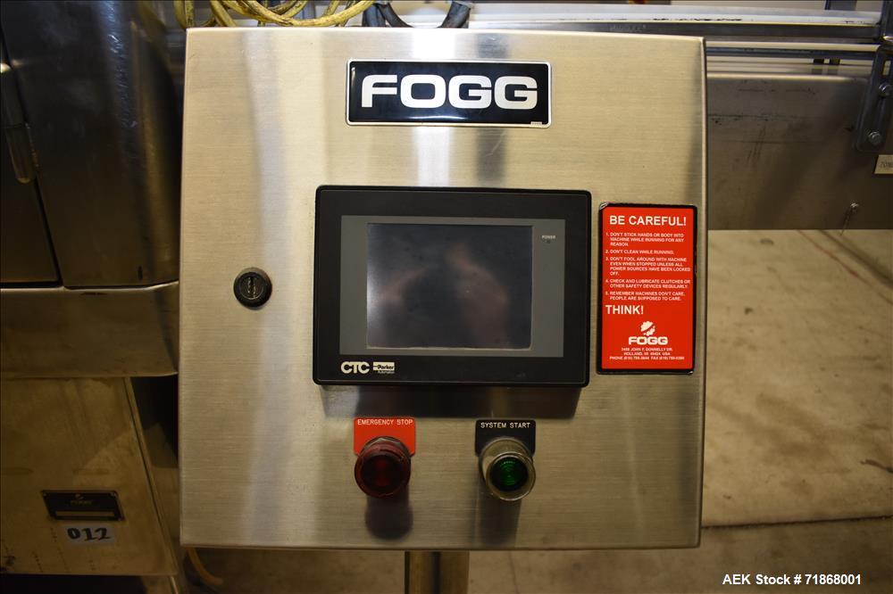 Used Fogg Model FA4214 High Speed Monoblock Liquid Filler and Capper.