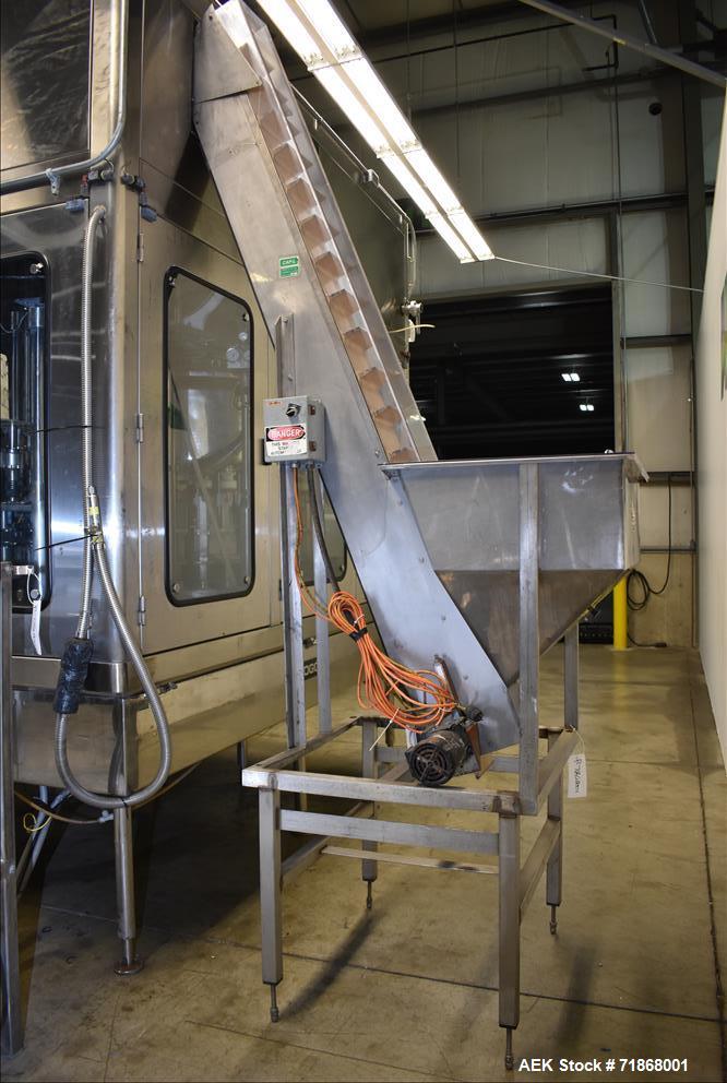 Used Fogg Model FA4214 High Speed Monoblock Liquid Filler and Capper.