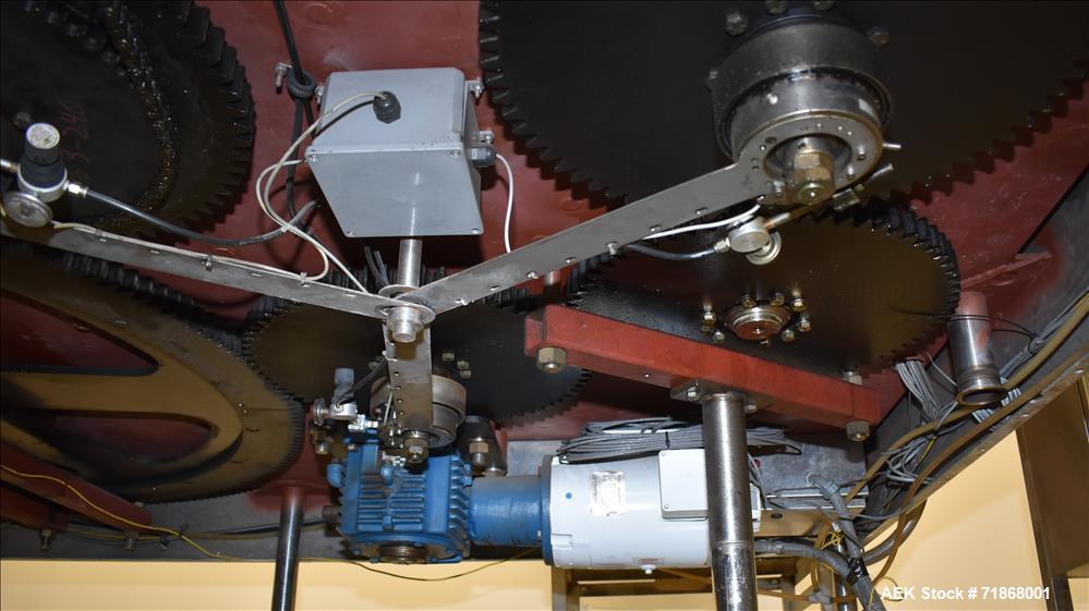 Used Fogg Model FA4214 High Speed Monoblock Liquid Filler and Capper.