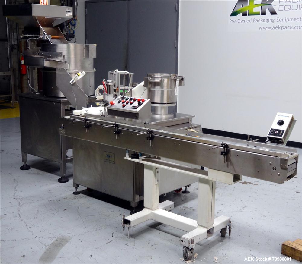 Used M&O Perry P-3000 II Monoblock Unscrambler, Filler, Plugger, and Screw Capper. Capable of speeds up to 35 bottles per minute. Has Watson Marlow Model 505Di Single head, peristaltic pump filler, H...