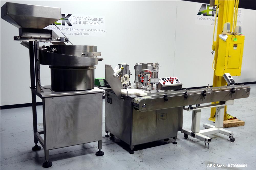 Used M&O Perry P-3000 II Monoblock Unscrambler, Filler, Plugger, and Screw Capper. Capable of speeds up to 35 bottles per minute. Has Watson Marlow Model 505Di Single head, peristaltic pump filler, H...
